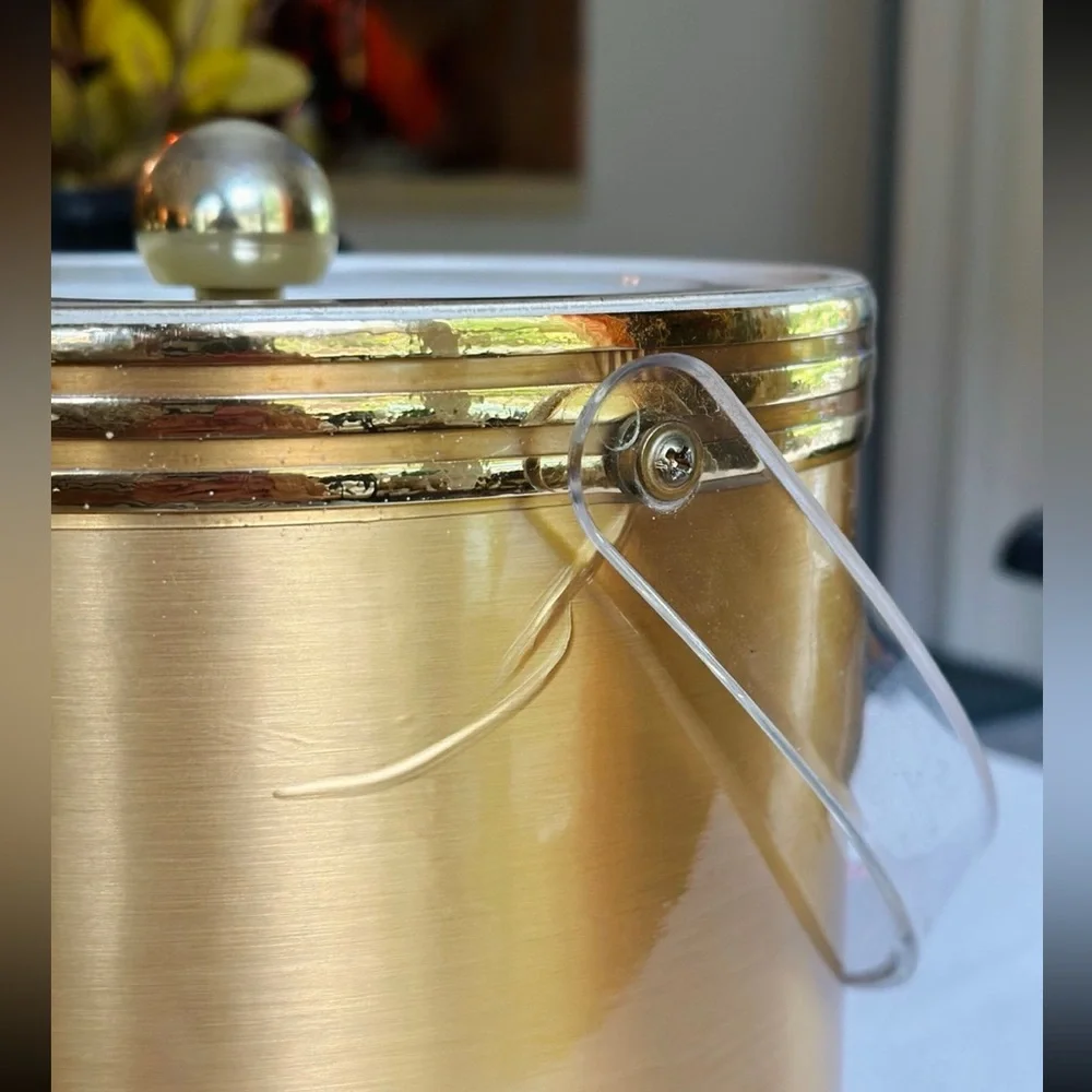 Vintage gold and lucite ice bucket